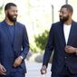 NBA players Markieff, left, and Marcus Morris arrive at Superior Court for the second day of their aggravated assault trial, Tuesday, Sept. 19, 2017, in Phoenix. The twins, along with Gerald Bowman, are charged with assaulting Erik Hood outside a recreation center in 2015 in Phoenix. (AP Photo/Matt York)