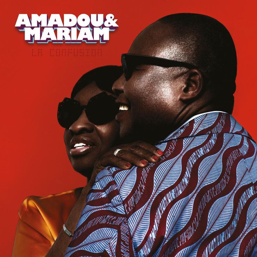 This image released by Because Music shows, “La Confusion," a new release by Amadou & Mariam. (Because Music via AP)