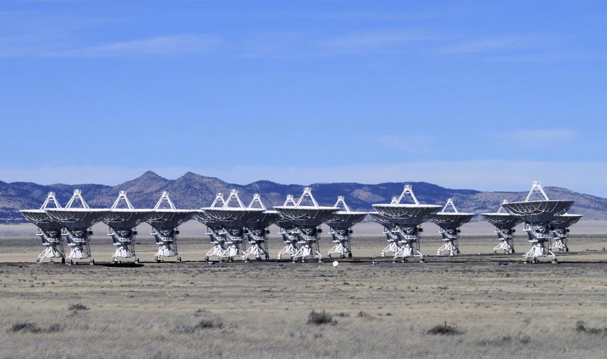 This Feb. 10, 2017 photo shows radio antennas that make up the Very Large Array astronomical observatory are positioned on tracks on the Plains of San Augustin west of Socorro, N.M. The Very Large Array is being used to make what astronomers say will be the sharpest radio image of a large swath of the sky as part of a 7-year project. (AP Photo/Susan Montoya Bryan)