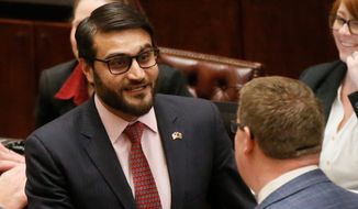 Hamdullah Mohib (left), Afghanistan&#39;s ambassador to the United States, said the Trump administration&#39;s plan for a long-term occupation in his country is the right way to capitalize on gains made in the past 16 years of war. (Associated Press/File)
