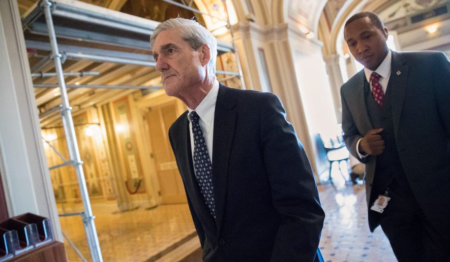Bills are going before the Senate to effectively block President Trump from dismissing special counsel Robert Mueller from his investigations into election meddling. (Associated Press)