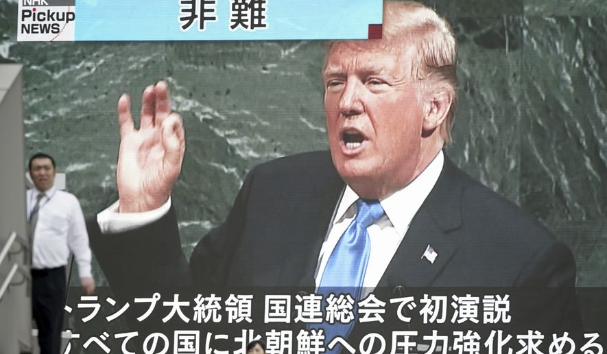 A man walks past a TV screen showing U.S. President Donald Trump speaks at the U.N. General Assembly, in Tokyo Wednesday, Sept. 20, 2017. Trump&#x27;s threat before the world to obliterate North Korea left no doubt about his determination to stop the communist country&#x27;s nuclear weapons buildup. (AP Photo/Eugene Hoshiko)
