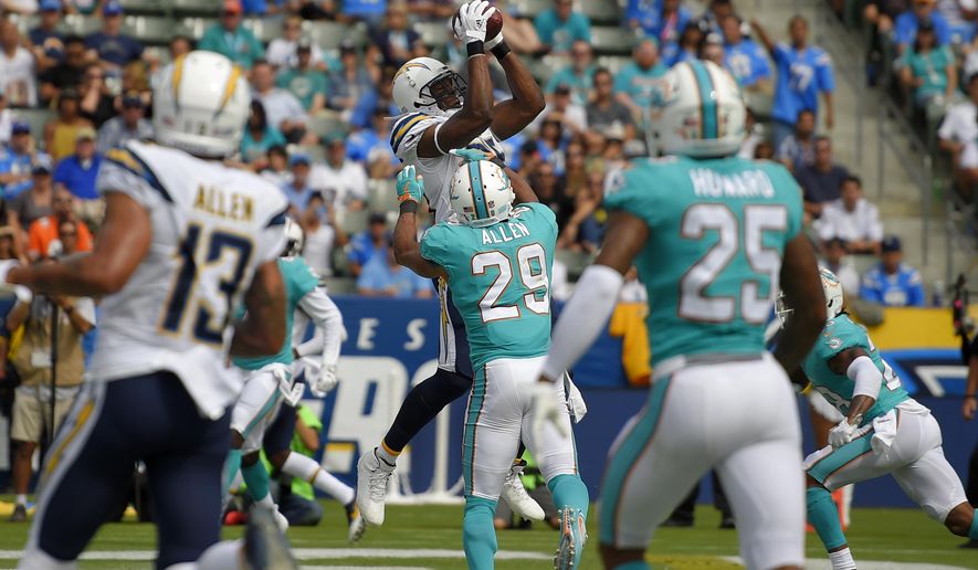 Los Angeles Chargers tight end Antonio Gates makes a touchdown catch during the second half of an NFL football game against the Miami Dolphins, Sunday, Sept. 17, 2017, in Carson, Calif. With the catch, Gates breaks the record previously held by Tony Gonzalez for most touchdown receptions by a tight end in NFL history. (AP Photo/Mark J. Terrill)