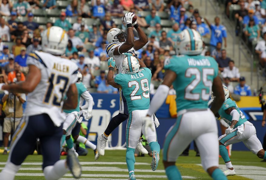 Los Angeles Chargers tight end Antonio Gates makes a touchdown catch during the second half of an NFL football game against the Miami Dolphins, Sunday, Sept. 17, 2017, in Carson, Calif. With the catch, Gates breaks the record previously held by Tony Gonzalez for most touchdown receptions by a tight end in NFL history. (AP Photo/Mark J. Terrill)