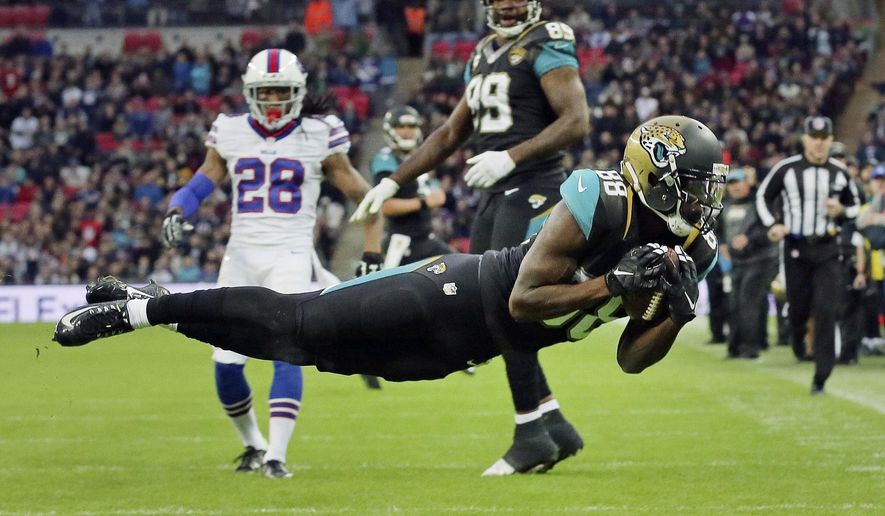 FILE - In this Oct. 25, 2015, file photo, Jacksonville Jaguars wide receiver Allen Hurns (88) makes a diving catch for a touchdown during an NFL football game against the Buffalo Bills at Wembley Stadium in London. Hurns got the nickname &amp;quot;Mr. London&amp;quot; last year, after his 42-yard touchdown reception beat Indianapolis across the pond. He also made a diving, 31-yard TD catch to stun Buffalo at Wembley Stadium in 2015. Hurns goes for a threepeat abroad Sunday against Baltimore. (AP Photo/Tim Ireland, File)