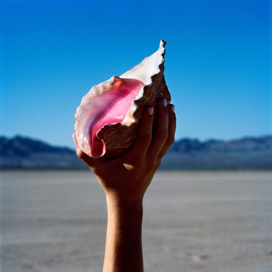This cover image released by Island shows "Wonderful Wonderful," the latest release by "The Killers." (Island via AP)
