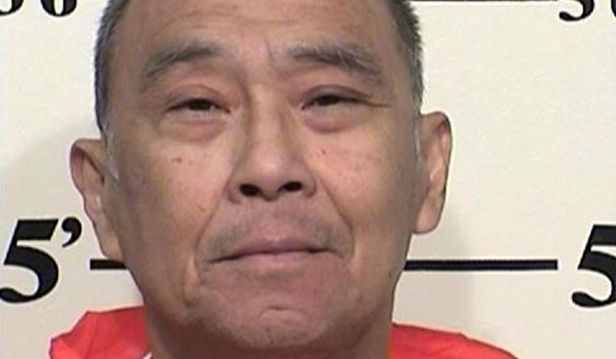 This May 8, 2013 photo provided by the California Department of Corrections and Rehabilitation shows Hau C. Chan, who was sentenced to serve life with the possibility of parole for second-degree murder. California's governor Gov. Jerry Brown on Sept. 15, 2017 overturned the parole board's recommendation to release Chan, convicted of masterminding a 1984 armed robbery that resulted in the death of a Los Angeles police officer. Brown said he believes there's evidence Hau Chan still "poses an unreasonable danger to society." (California Department of Corrections and Rehabilitation via AP)