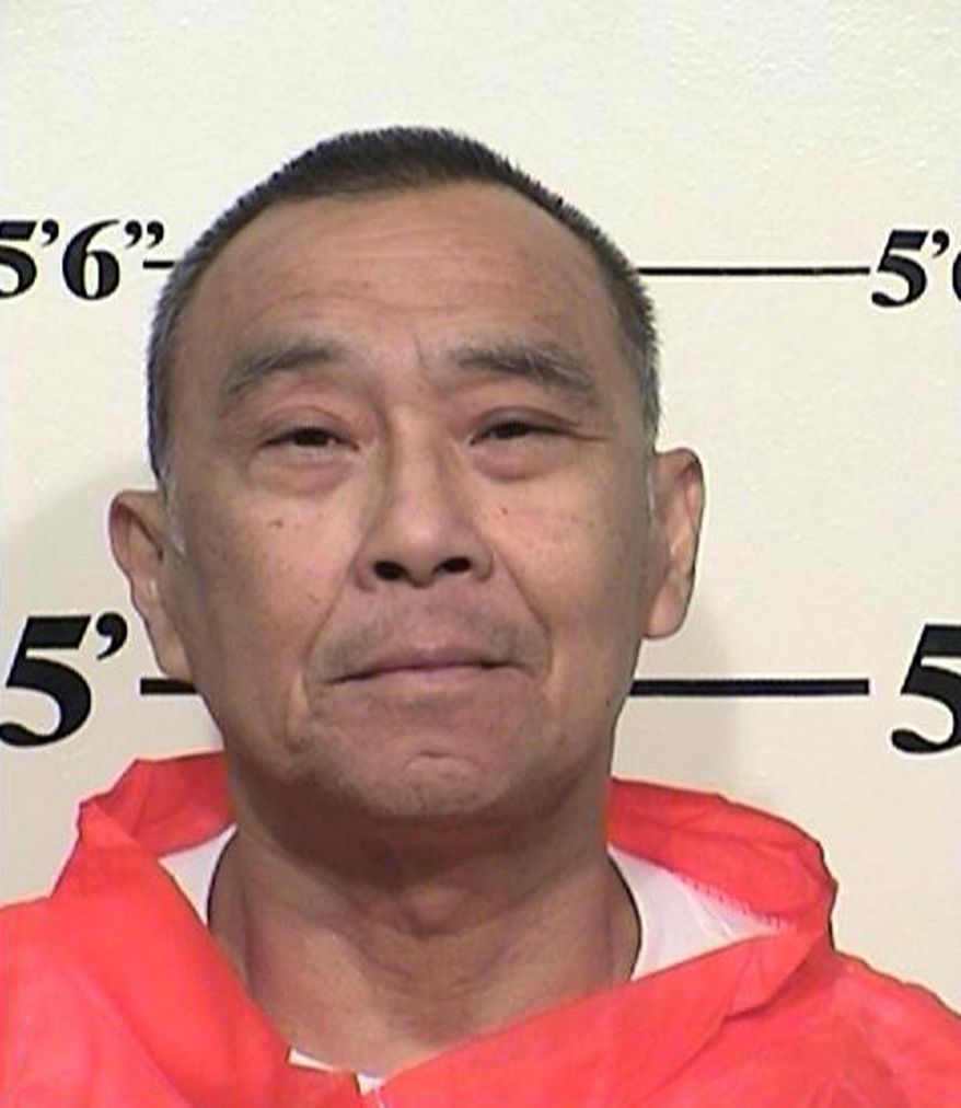 This May 8, 2013 photo provided by the California Department of Corrections and Rehabilitation shows Hau C. Chan, who was sentenced to serve life with the possibility of parole for second-degree murder. California's governor Gov. Jerry Brown on Sept. 15, 2017 overturned the parole board's recommendation to release Chan, convicted of masterminding a 1984 armed robbery that resulted in the death of a Los Angeles police officer. Brown said he believes there's evidence Hau Chan still "poses an unreasonable danger to society." (California Department of Corrections and Rehabilitation via AP)