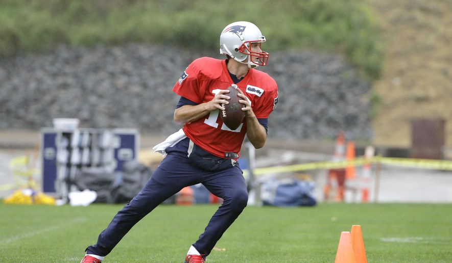 New England Patriots quarterback Tom Brady performs field drills during an NFL football practice, Wednesday, Sept. 20, 2017, in Foxborough, Mass. (AP Photo/Steven Senne)