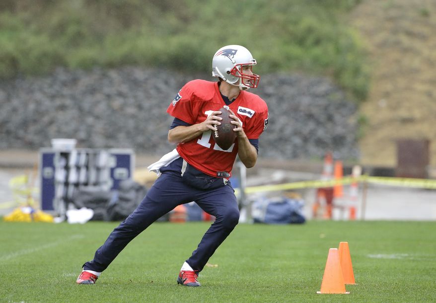 New England Patriots quarterback Tom Brady performs field drills during an NFL football practice, Wednesday, Sept. 20, 2017, in Foxborough, Mass. (AP Photo/Steven Senne)