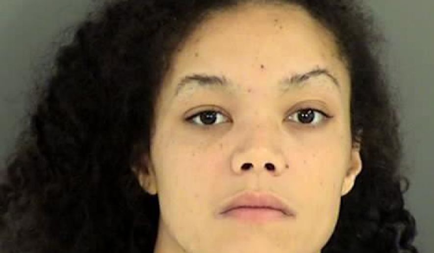 This booking photo released by the Henrico County, Virginia, Sheriff's Office shows Karisa Daniels on Tuesday, Sept. 19, 2017. Daniels shot and wounded a Virginia state trooper after a high-speed chase on Tuesday. (Henrico County, Virginia, Sheriff's Office via AP)