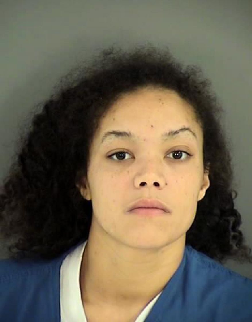This booking photo released by the Henrico County, Virginia, Sheriff's Office shows Karisa Daniels on Tuesday, Sept. 19, 2017. Daniels shot and wounded a Virginia state trooper after a high-speed chase on Tuesday. (Henrico County, Virginia, Sheriff's Office via AP)