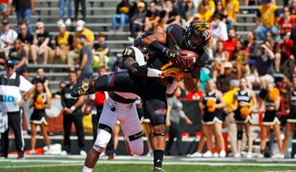 Maryland receiver D.J. Moore leads the Big Ten with an average of 115 yards receiving per game while the Terrapins score 57 points per game. (Associated Press)