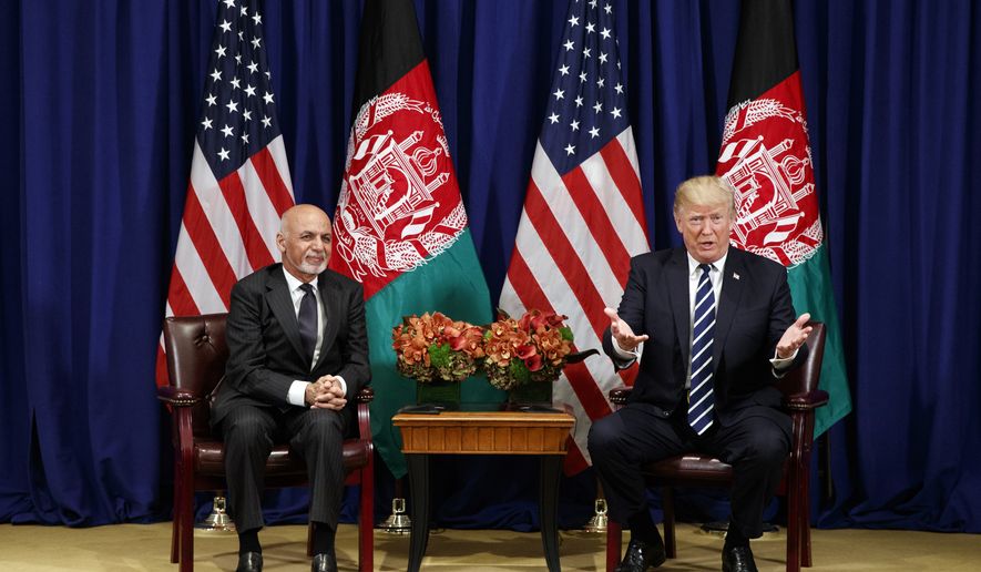 President Donald Trump meets with Afghan President Ashraf Ghani at the Palace Hotel during the United Nations General Assembly, Thursday, Sept. 21, 2017, in New York. (AP Photo/Evan Vucci)