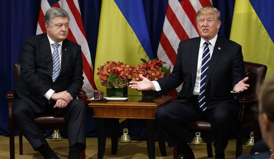 President Donald Trump meets with Ukraine&#39;s President Petro Poroshenko at the Palace Hotel during the United Nations General Assembly, Thursday, Sept. 21, 2017, in New York. (AP Photo/Evan Vucci/File)