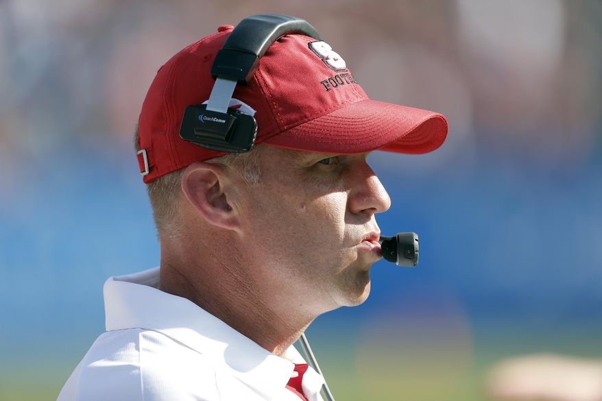 FILE - In this Sept. 2, 2017, file photo, North Carolina State head coach Dave Doeren on the sideline against South Carolina during the second half of an NCAA football game in Charlotte, N.C. The Wolfpack visits No. 12 Florida State on Saturday in a key division matchup to headline Week 4 in the Atlantic Coast Conference. (AP Photo/Bob Leverone, File)