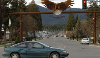FILE - In this April 27, 2011 photo, the entrance to downtown Libby, Mont., is seen. The cleanup of the northwest Montana community where health officials say hundreds of people have been killed by asbestos exposure entered a new phase Thursday, Sept. 21, 2017, as officials begin crafting ways to keep residents safe over the long term. The five-member Libby Asbestos Superfund Advisory Team was scheduled to meet for the first time after being established by the Montana Legislature earlier this year. (AP Photo/Matthew Brown, File)