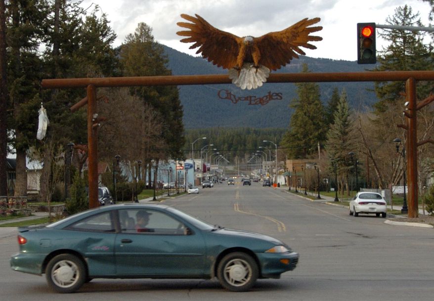 FILE - In this April 27, 2011 photo, the entrance to downtown Libby, Mont., is seen. The cleanup of the northwest Montana community where health officials say hundreds of people have been killed by asbestos exposure entered a new phase Thursday, Sept. 21, 2017, as officials begin crafting ways to keep residents safe over the long term. The five-member Libby Asbestos Superfund Advisory Team was scheduled to meet for the first time after being established by the Montana Legislature earlier this year. (AP Photo/Matthew Brown, File)