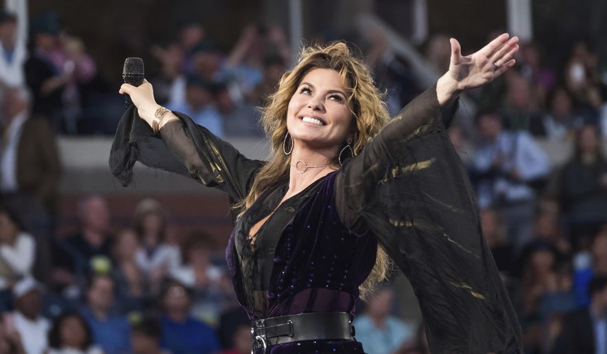 FILE - This Aug. 28, 2017 file photo shows Shania Twain performing at the opening night ceremony of the 2017 U.S. Open Tennis Championships in New York. When the queen of country pop contracted Lyme’s disease, she thought her singing career was over. Twain says the process of finding her voice again was gruesome and trying. She trained with coaches and worked extensively on her vocals, comparing the experience to an athlete recovering from a major injury. The result is “Now,” her first album in 17 years to be released Sept. 29. (Photo by Charles Sykes/Invision/AP, File)