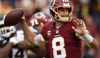Washington Redskins quarterback Kirk Cousins passes against the Los Angeles Rams during the first half of an NFL football game Sunday, Sept. 17, 2017, in Los Angeles. (AP Photo/Kelvin Kuo)