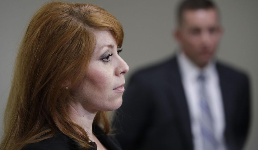Sgt. Esmeralda Boveda of the Las Vegas police department speaks during a news conference Thursday, Sept. 21, 2017, in Las Vegas. Las Vegas police officers can no longer routinely use neck restraints to render combative people unconscious, but can still use the department-approved technique in a life-or-death struggle.(AP Photo/John Locher)