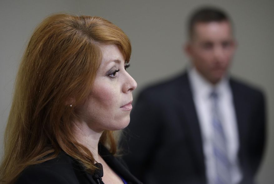Sgt. Esmeralda Boveda of the Las Vegas police department speaks during a news conference Thursday, Sept. 21, 2017, in Las Vegas. Las Vegas police officers can no longer routinely use neck restraints to render combative people unconscious, but can still use the department-approved technique in a life-or-death struggle.(AP Photo/John Locher)
