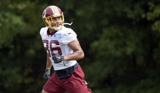 Washington Redskins tight end Jordan Reed participates in NFL football practice at Redskins Park in Ashburn, Va., Friday, Sept. 22, 2017. It&#39;s only Week 3, and the Washington Redskins are hurting as they prepare to face the Oakland Raiders on Sunday night. With all the injuries, burgundy and gold has been replaced by black and blue. Reed is being bothered by a chest/rib injury. (AP Photo/Susan Walsh)