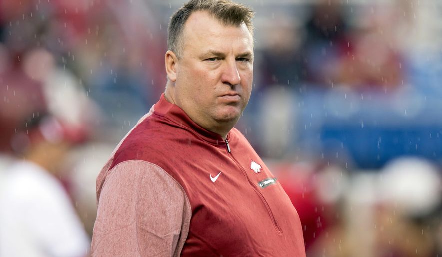 FILE - In this Aug. 31, 2017, file photo, Arkansas coach Bret Bielema walks across the field before the team&#39;s NCAA college football game against Florida A&amp;amp;M in Little Rock, Ark. Bielema has had his share of struggles in the Southeastern Conference since leaving Wisconsin following the 2012 season. None have frustrated Razorbacks fans quite as much as the school’s recent woes against Texas A&amp;amp;M. (AP Photo/Gareth Patterson, File)