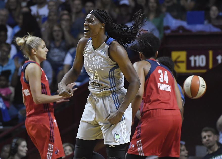 FILE - In this Sept. 14, 2017, file photo, Minnesota Lynx center Sylvia Fowles (34) celebrates after scoring against the Washington Mystics during the first half of Game 2 of the WNBA basketball semifinals in Minneapolis. While Fowles was sitting out the 2015 season waiting for a trade, the 2017 WNBA MVP spent a lot of time cycling. It was a chance for her to stay in shape and keep her mind focused on other things besides basketball. Now she&#x27;s giving others a chance to cycle, donating a portion of her MVP bonus to Cycles for Change. It&#x27;s a local organization that gives girls access to bicycles. (Aaron Lavinsky/Star Tribune via AP, File)