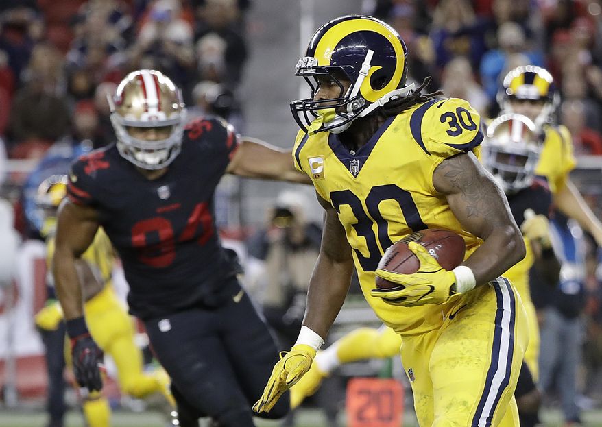 Los Angeles Rams running back Todd Gurley (30) runs against the San Francisco 49ers during the second half of an NFL football game in Santa Clara, Calif., Thursday, Sept. 21, 2017. (AP Photo/Marcio Jose Sanchez)