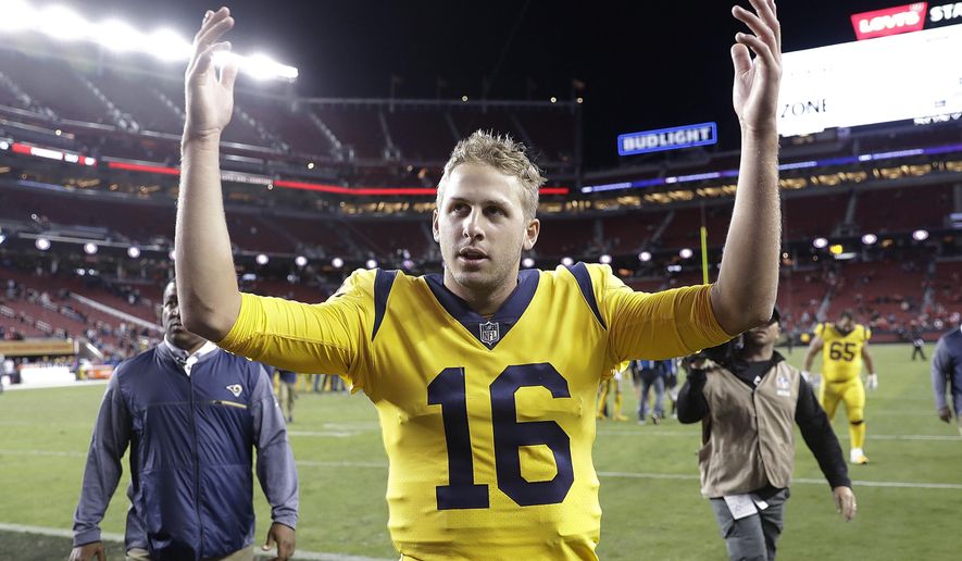 Los Angeles Rams quarterback Jared Goff (16) gestures toward fans after an NFL football game between the San Francisco 49ers and the Rams in Santa Clara, Calif., Thursday, Sept. 21, 2017. The Rams won 41-39. (AP Photo/Marcio Jose Sanchez)