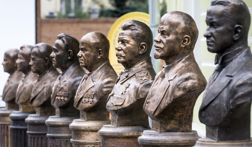 A series of busts of Russia&#x27;s rulers, including Vladimir Lenin, second right, and Josef Stalin, third right, are on display in Moscow, Russia, Friday, Sept. 22, 2017. The Russian Military-Historic Society, an organization founded by President Vladimir Putin and led by his culture minister, unveiled the sculptures Friday to expand its &amp;quot;alley of rulers&amp;quot; at a Moscow park, which until now had featured busts of Russian monarchs. It described the new display as part of efforts to preserve Russian history. (AP Photo/Alexander Zemlianichenko)