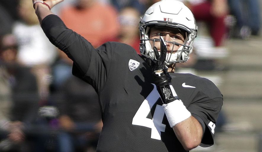 Washington State quarterback Luke Falk (4) throws a pass during the first half of an NCAA college football game against Nevada in Pullman, Wash., Saturday, Sept. 23, 2017. (AP Photo/Young Kwak)