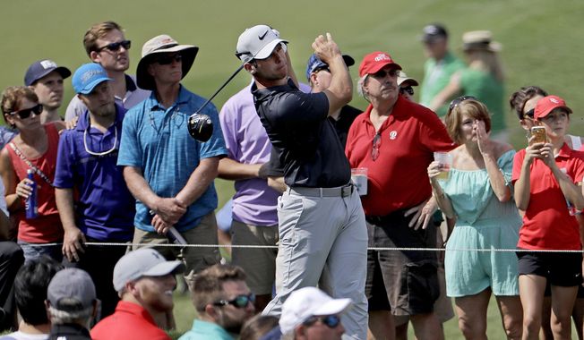 Paul Casey of England tees off the fourth hole during the third round of the Tour Championship golf tournament at East Lake Golf Club in Atlanta, Saturday, Sept. 23, 2017. (AP Photo/David Goldman)