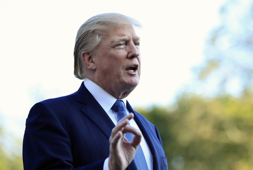 President Donald Trump speaks to reporters upon his return to the White House in Washington, Sunday, Sept. 24, 2017. (AP Photo/Manuel Balce Ceneta)
