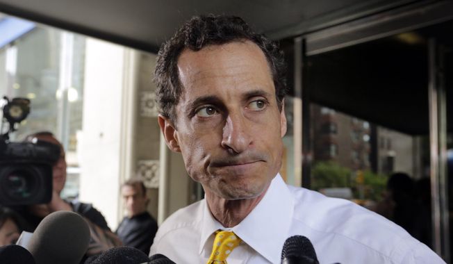 In this July 24, 2013, file photo, former Democratic U.S. Rep. Anthony Weiner leaves his apartment building in New York. Weiner was sentenced Monday, Sept. 25, 2017, for sending obscene material to a 15-year-old girl in 2016. (AP Photo/Richard Drew, File)