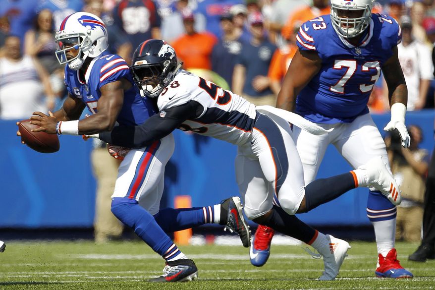 Buffalo Bills quarterback Tyrod Taylor, left, is sacked by Denver Broncos outside linebacker Von Miller during the first half of an NFL football game, Sunday, Sept. 24, 2017, in Orchard Park, N.Y. (AP Photo/Jeffrey T. Barnes)