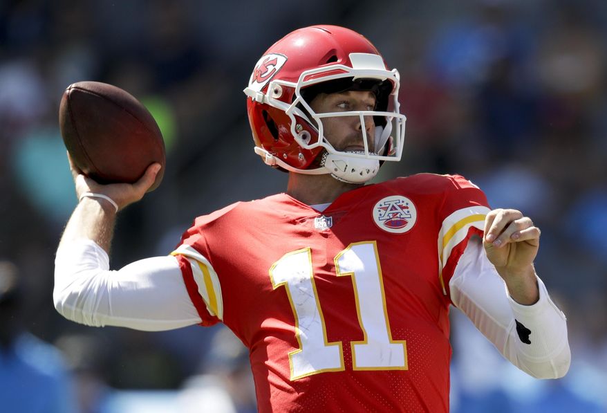 Kansas City Chiefs quarterback Alex Smith passes against the Los Angeles Chargers during the first half of an NFL football game Sunday, Sept. 24, 2017, in Carson, Calif. (AP Photo/Jae C. Hong)