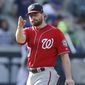 Washington Nationals second baseman Daniel Murphy gestures after a victory over the New York Mets in a baseball game, Sunday, Sept. 24, 2017, in New York. (AP Photo/Kathy Willens)