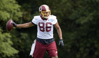 Washington Redskins tight end Jordan reed participates in NLF football practice at Redskins Park in Ashburn, Va., Friday, Sept. 22, 2017. It&#39;s only Week 3, and the Redskins are hurting as they prepare to face the Oakland Raiders on Sunday night. With all the injuries, burgundy and gold has been replaced by black and blue. Reed is being bothered by a chest/rib injury. (AP Photo/Susan Walsh) **FILE**