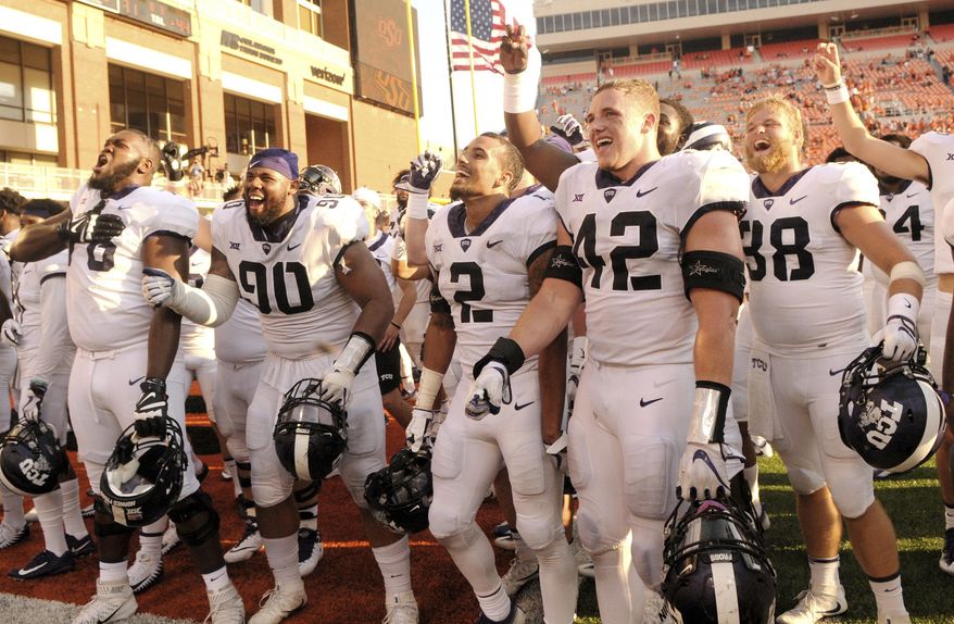 TCU players celebrate with their fans in the end zone of Boone Pickens Stadium in Stillwater, Okla., Saturday, Sept. 23, 2017. TCU defeated Oklahoma State 44-31.(AP Photo/Brody Schmidt)