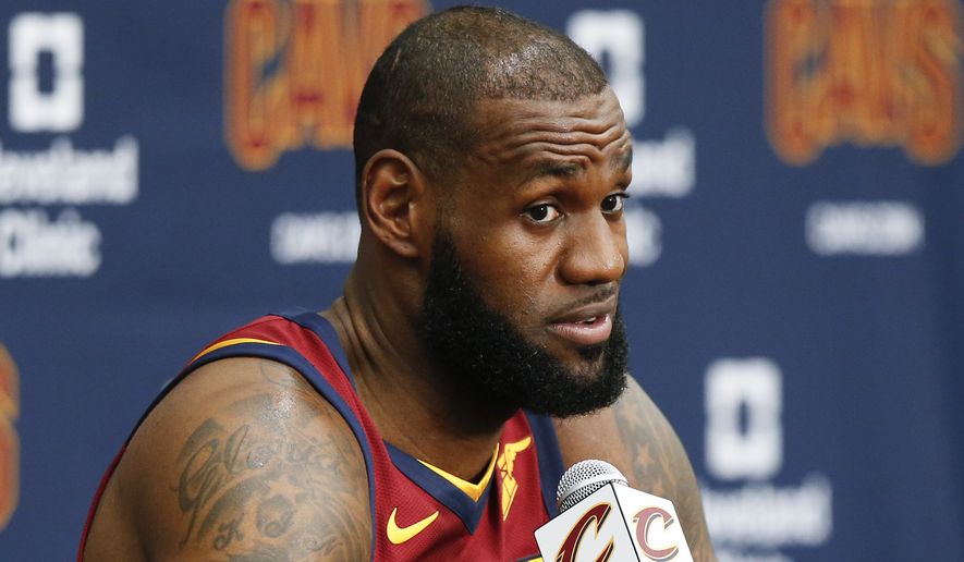 Cleveland Cavaliers&#39; LeBron James answers questions during the NBA basketball team media day, Monday, Sept. 25, 2017, in Independence, Ohio. (AP Photo/Ron Schwane)