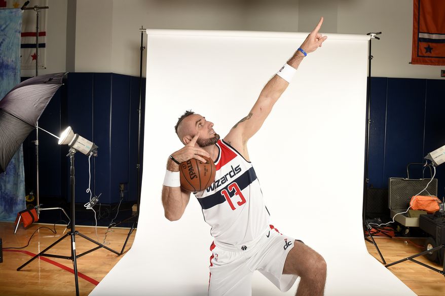 Washington Wizards' Marcin Gortat, of Poland, poses for a photograph during an NBA basketball media day, Monday, Sept. 25, 2017, in Washington. (AP Photo/Nick Wass)