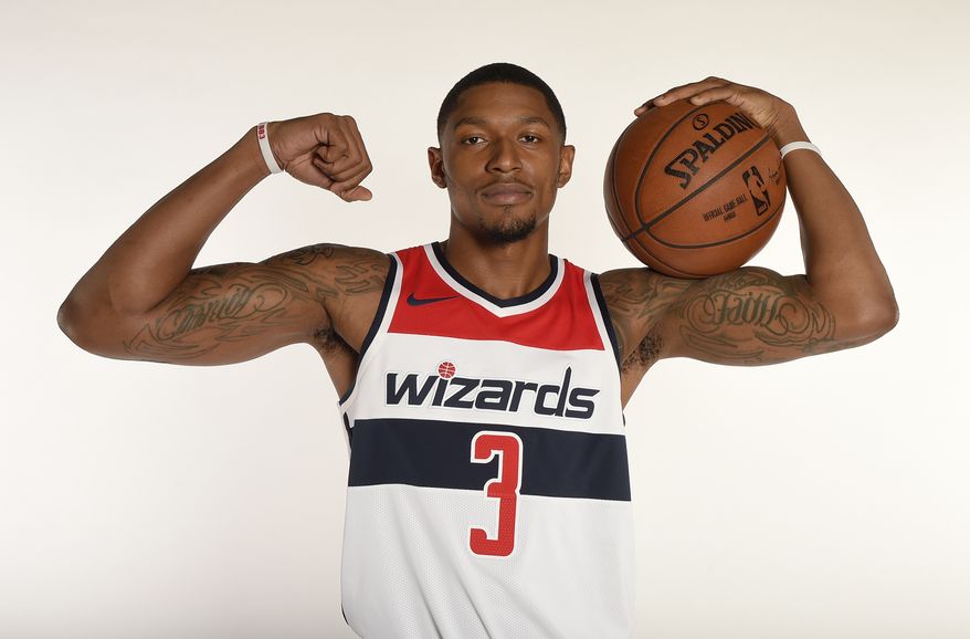 Washington Wizards' Bradley Beal poses for a photograph during an NBA basketball media day, Monday, Sept. 25, 2017, in Washington. (AP Photo/Nick Wass)