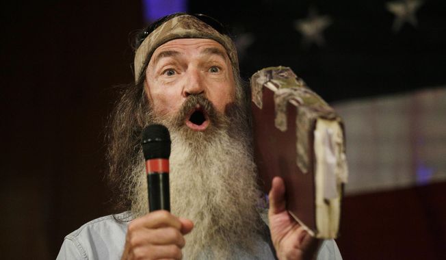 Phil Robertson of &quot;Duck Dynasty&quot; speaks at a rally for U.S. Senate hopeful Roy Moore, Monday, Sept. 25, 2017, in Fairhope, Ala. (AP Photo/Brynn Anderson) ** FILE **