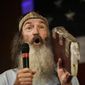 Phil Robertson of &quot;Duck Dynasty&quot; speaks at a rally for U.S. Senate hopeful Roy Moore, Monday, Sept. 25, 2017, in Fairhope, Ala. (AP Photo/Brynn Anderson) ** FILE **
