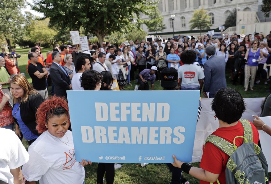 In this file photo, immigrant-rights supporters gather at the U.S. Capitol in Washington, Tuesday, Sept. 26, 2017. Frustrated with both President Trump and Congress, activists are increasingly turning to the courts to try to alter the country&#39;s immigration policies. (AP Photo/Pablo Martinez Monsivais) **FILE**