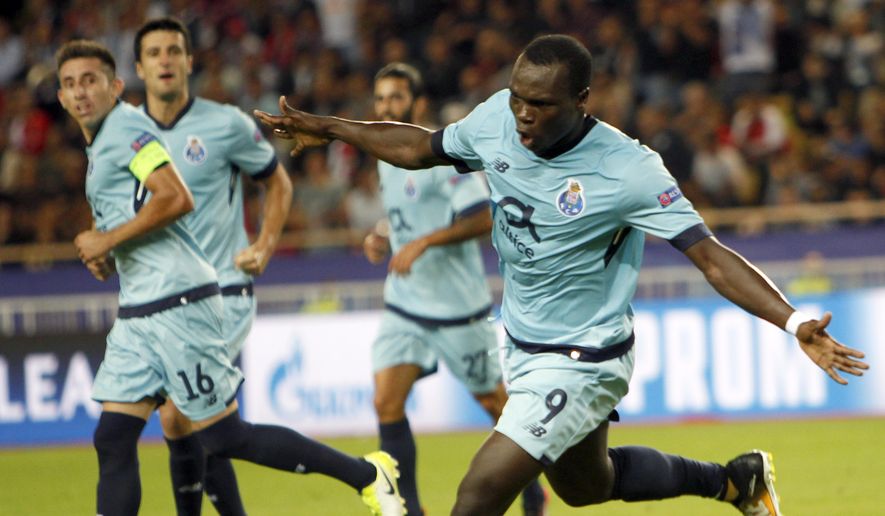 Porto&#39;s Vincent Aboubakar reacts after scoring the opening goal during the Champions League Group G first leg soccer match between Monaco and FC Porto at Louis II stadium in Monaco, Tuesday, Sept. 26, 2017. (AP Photo/Claude Paris)
