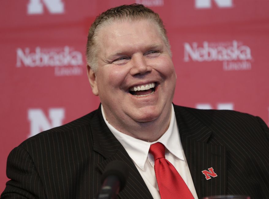 Dave Rimington laughs during a news conference in Lincoln, Neb., Tuesday, Sept. 26, 2017, to announce he has been named the interim Nebraska athletic director. Rimington, who became the most decorated offensive lineman in college football history in the early 1980s, was named Nebraska's interim athletic director as the school searches for a permanent successor to Shawn Eichorst. (AP Photo/Nati Harnik)