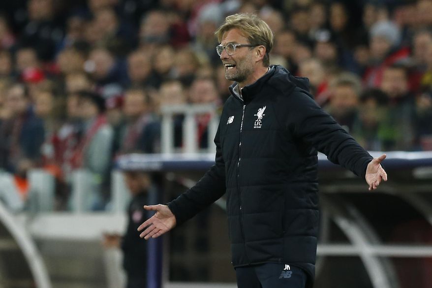 Liverpool coach Juergen Klopp gestures during the Champions League soccer match between Spartak Moscow and Liverpool in Moscow, Russia, Tuesday, Sept. 26, 2017. (AP Photo/Alexander Zemlianichenko)